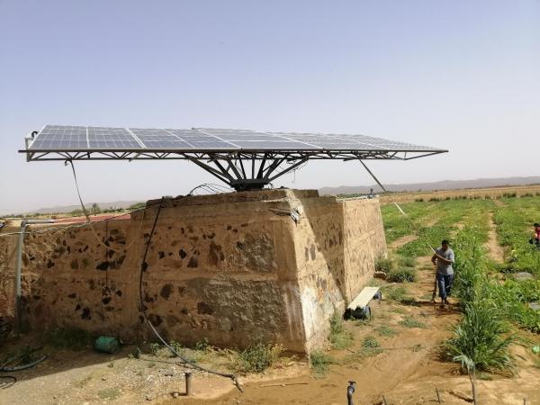 Solar panel powering irrigation in Tinghire, Morocco. The farmer turns the panel (to follow the sun) to increase its operating time during the day © F. Hamamouche, CIRAD